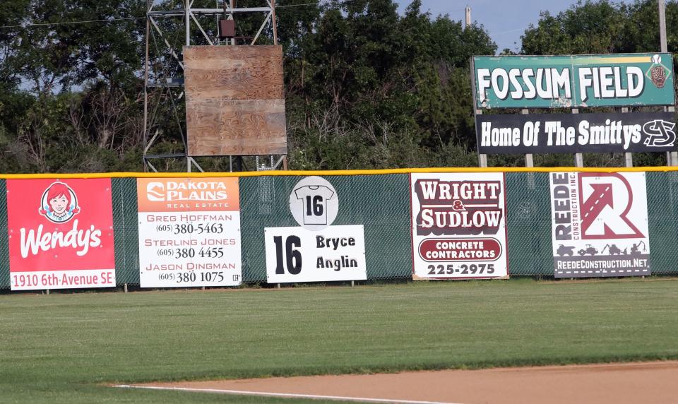 There's a sign memorializing Bryce Anglin in the outfield at Fossum Field.