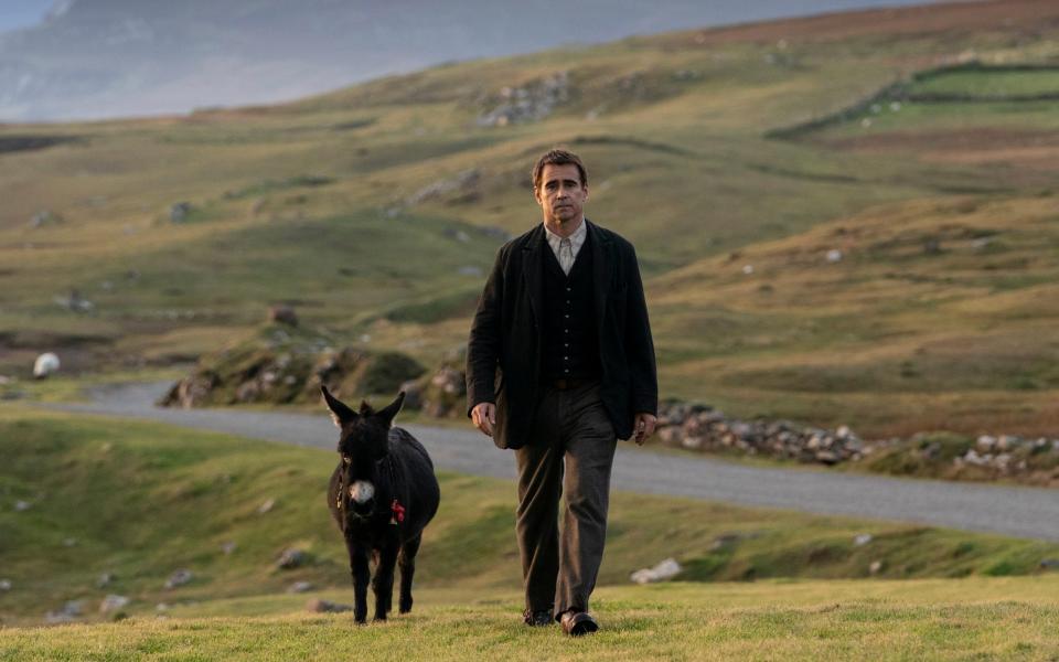 'Rural backwardness': Pádraic (Colin Farrell) with his miniature donkey Jenny - Jonathan Hession. Searchlight Pictures via AP