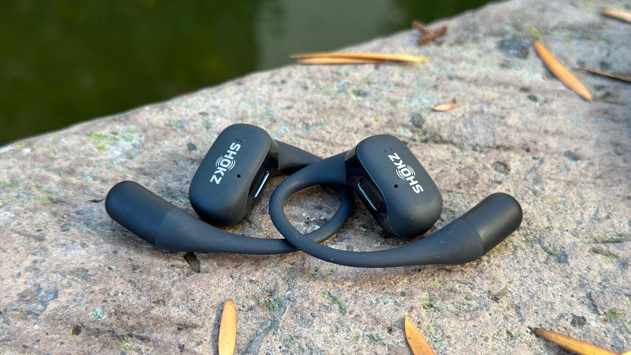  A close-up of the Shokz OpenFit sitting on top of one another. 