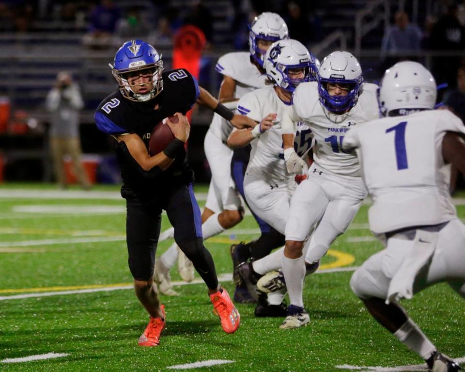 Indian Land quarterback Jaxon Scheidt carries the ball during the varsity football game against Parkwood on Friday, Sept. 23, 2022 in Indian Land.