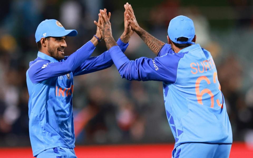 India celebrate the wicket of Afif Hossain - James Elsby/AP