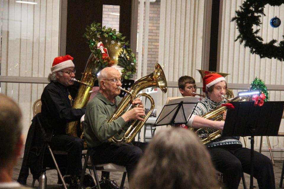 Area low brass players perform during the first TUBACHRISTMAS on Saturday, Dec. 10, 2022, at First United Methodist Church in Perry.