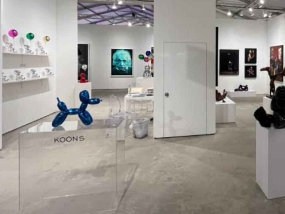 A Jeff Koons balloon dog sculpture is seen on display before it was shattered in Miami (Bel-Air Fine Art Contemporary Art Galleries)