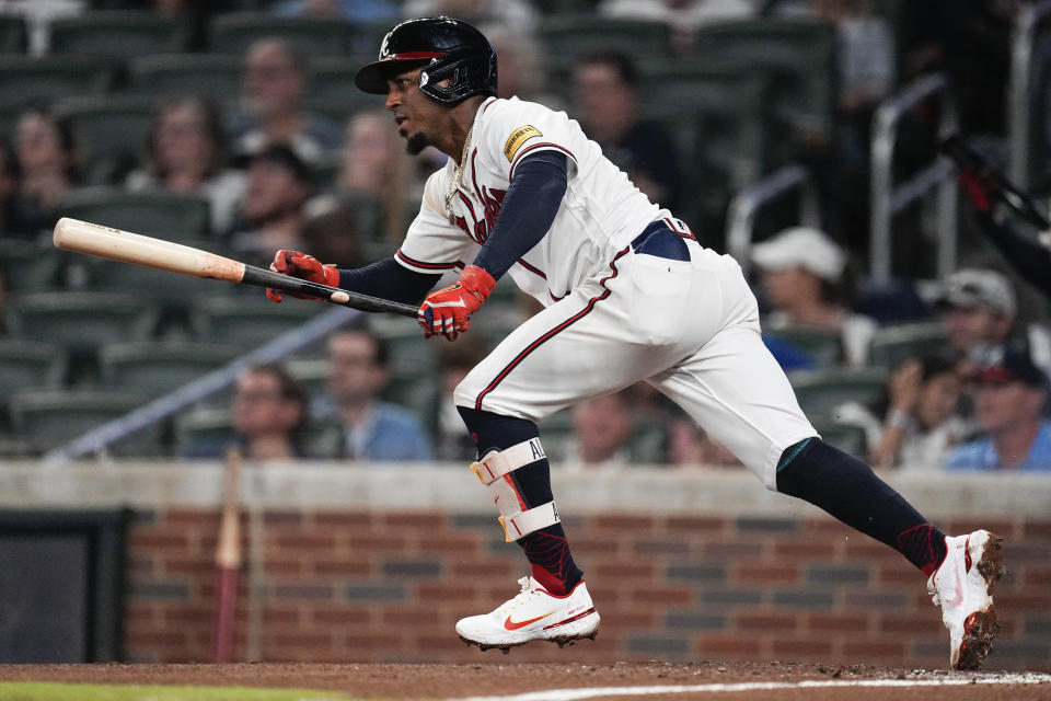 Atlanta Braves' Ozzie Albies runs to first base after hitting a single in the first inning of a baseball game against the Philadelphia Phillies Tuesday, Sept. 19, 2023. (AP Photo/John Bazemore)