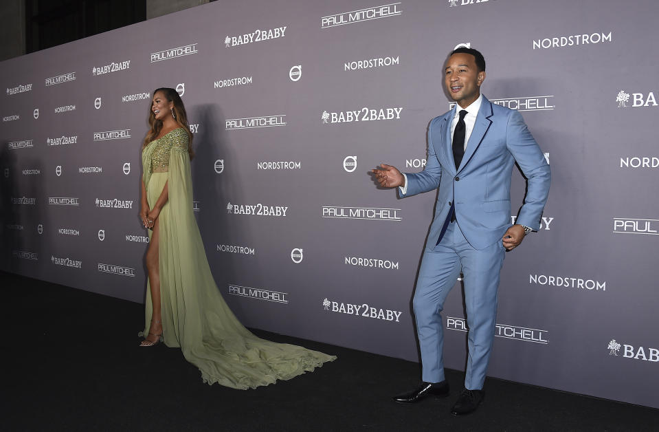 John Legend, right, and Chrissy Teigen arrive at the 2019 Baby2Baby Gala on Saturday, Nov. 9, 2019, in Culver City, Calif. (Photo by Jordan Strauss/Invision/AP)