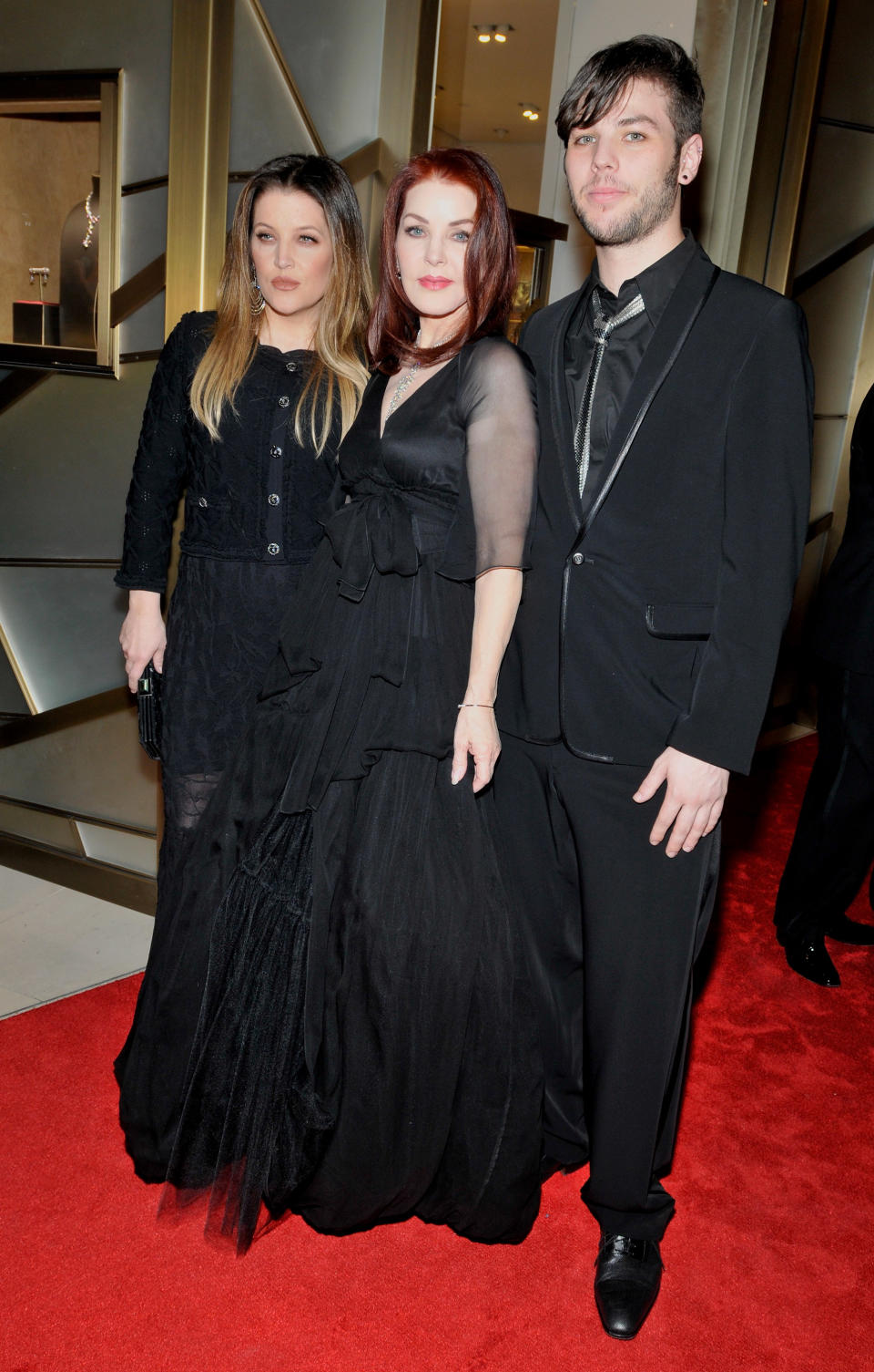 Priscilla on the red carpet with her two children