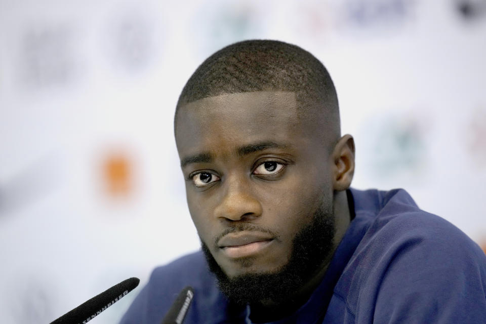 France's Dayot Upamecano attends a press conference at the Jassim Bin Hamad stadium in Doha, Qatar, Thursday, Dec. 8, 2022. France will play against England during their World Cup quarter-final soccer match on Dec. 10. (AP Photo/Christophe Ena)