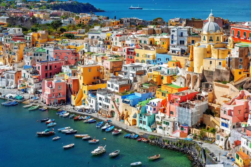 Colorful traditional houses in the Old town port of Procida island, Naples, Italy