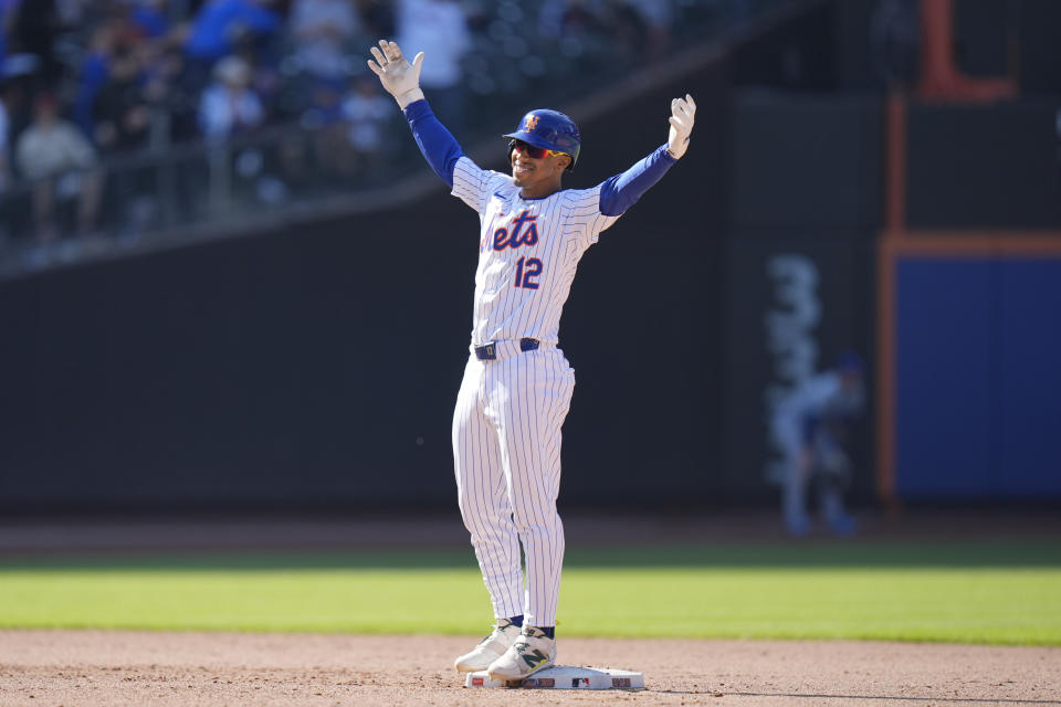 New York Mets' Francisco Lindor reacts after hitting a walk-off two-run double in the 11th inning of a baseball game against the Chicago Cubs at Citi Field, Thursday, May 2, 2024, in New York. The Mets defeated the Cubs 7-6 in 11 innings. (AP Photo/Seth Wenig)