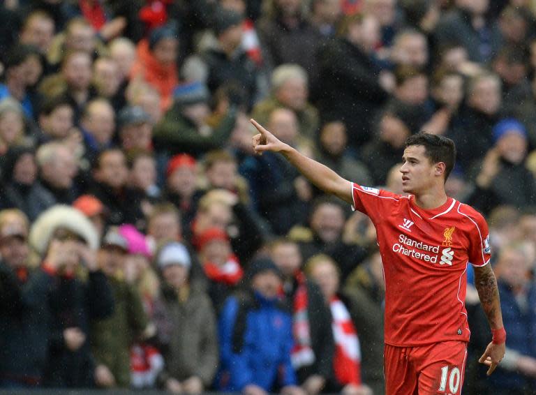 Liverpool's Philippe Coutinho celebrates scoring a goal during their English Premier League match between against Manchester City, at Anfield in Liverpool, north-west England, on March 1, 2015