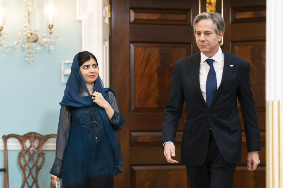 Secretary of State Antony Blinken and Pakistani activist for female education and a Nobel Peace Prize laureate Malala Yousafzai, walk to the Treaty Room at the State Department, Monday, Dec. 6, 2021, in Washington. (AP Photo/Manuel Balce Ceneta, Pool)