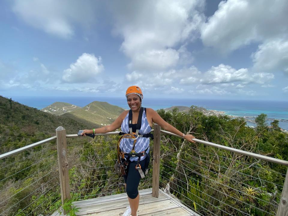 A woman stands on deck at Rainforest Adventure in St. Martin.