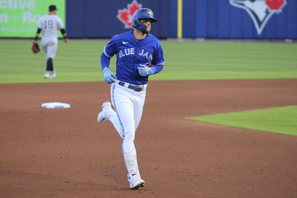 Toronto Blue Jays Cavan Biggio rounds the bases after hitting a home run off New York Yankees pitcher Gerrit Cole during the fifth inning of a baseball game Wednesday, June 16, 2021, in Buffalo, N.Y. (AP Photo/Jeffrey T. Barnes)