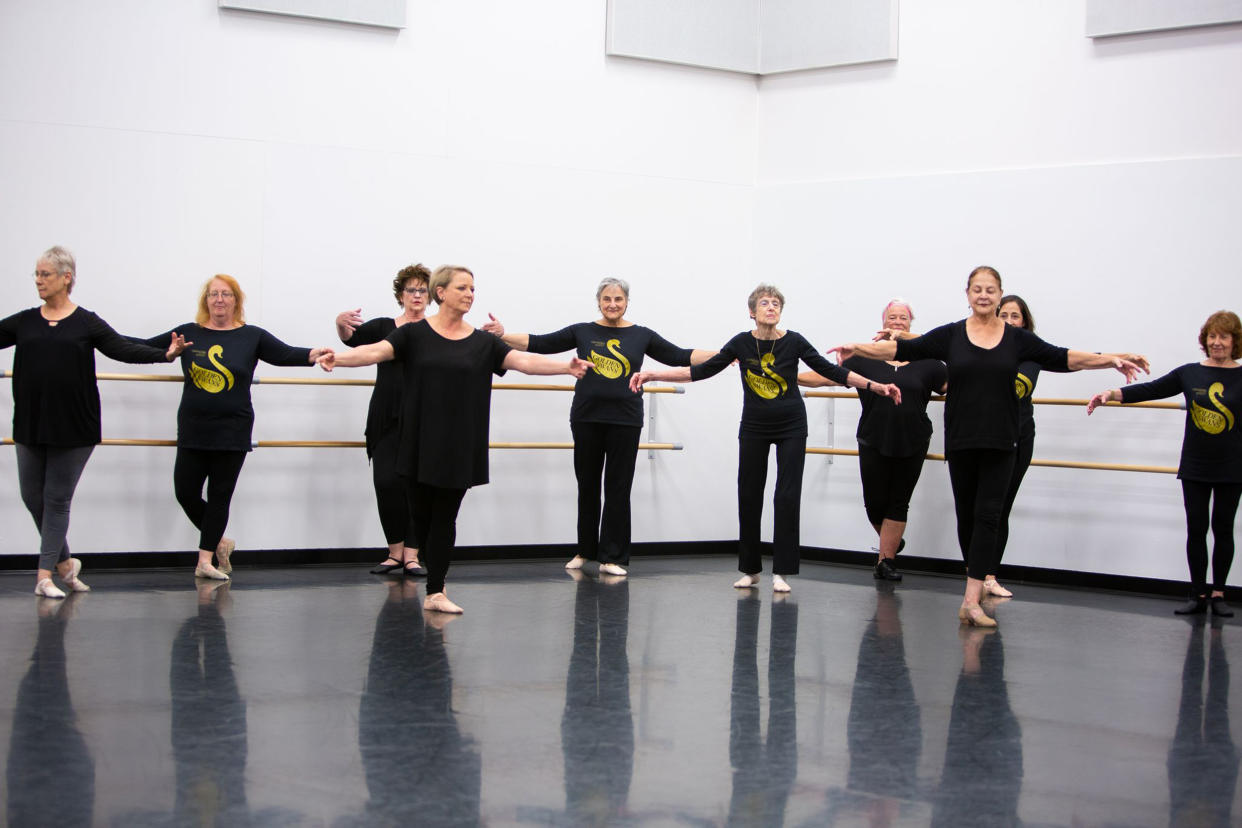 Robin Martin (fourth from the left) dances alongside her fellow Swans. (Courtesy Jana Carson)