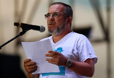 FARC rebel leader Rodrigo Londono, better known by hs nom de guerre Timochenko talks during the closing ceremony of a rebel congress near El Diamante in Yari Plains, Colombia, September 23, 2016. REUTERS /John Vizcaino