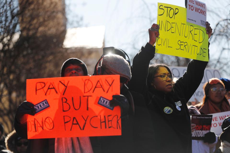 Union members and other federal employees rally to call for an end to the partial government shutdown, Jan. 10, 2019 at AFL-CIO Headquarters in Washington.