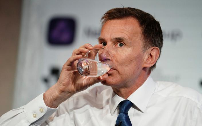 Jeremy Hunt, the Chancellor, is pictured at a British Chambers of Commerce conference in London this morning - Jordan Pettitt/PA