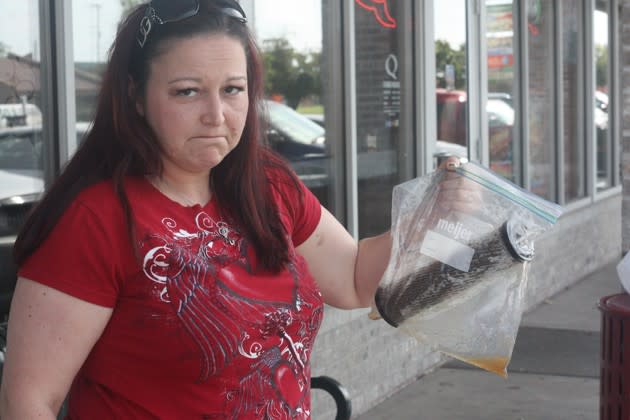 LeeAnne Walters shows a water filter from her home. (Alana Semuels)