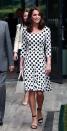 <p>The Duchess arrived for the first day of Wimbledon in a stand-out polka dot dress by Dolce & Gabbana. Sporting a brand new shorter hairstyle, Kate paired the £930 dress with block-heeled sandals and a white leather bag.<br><i>[Photo: PA]</i> </p>