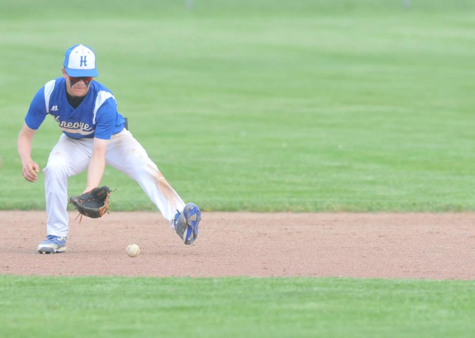 Honeoye's Sam Clark fields a ground ball at second base during Monday's Class D1 game against Hammondsport.