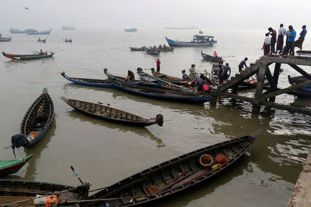 Rohingya fishermen are pictured at the port in Sittwe in the state of Rakhine, Myanmar March 3, 2017. REUTERS/Soe Zeya Tun