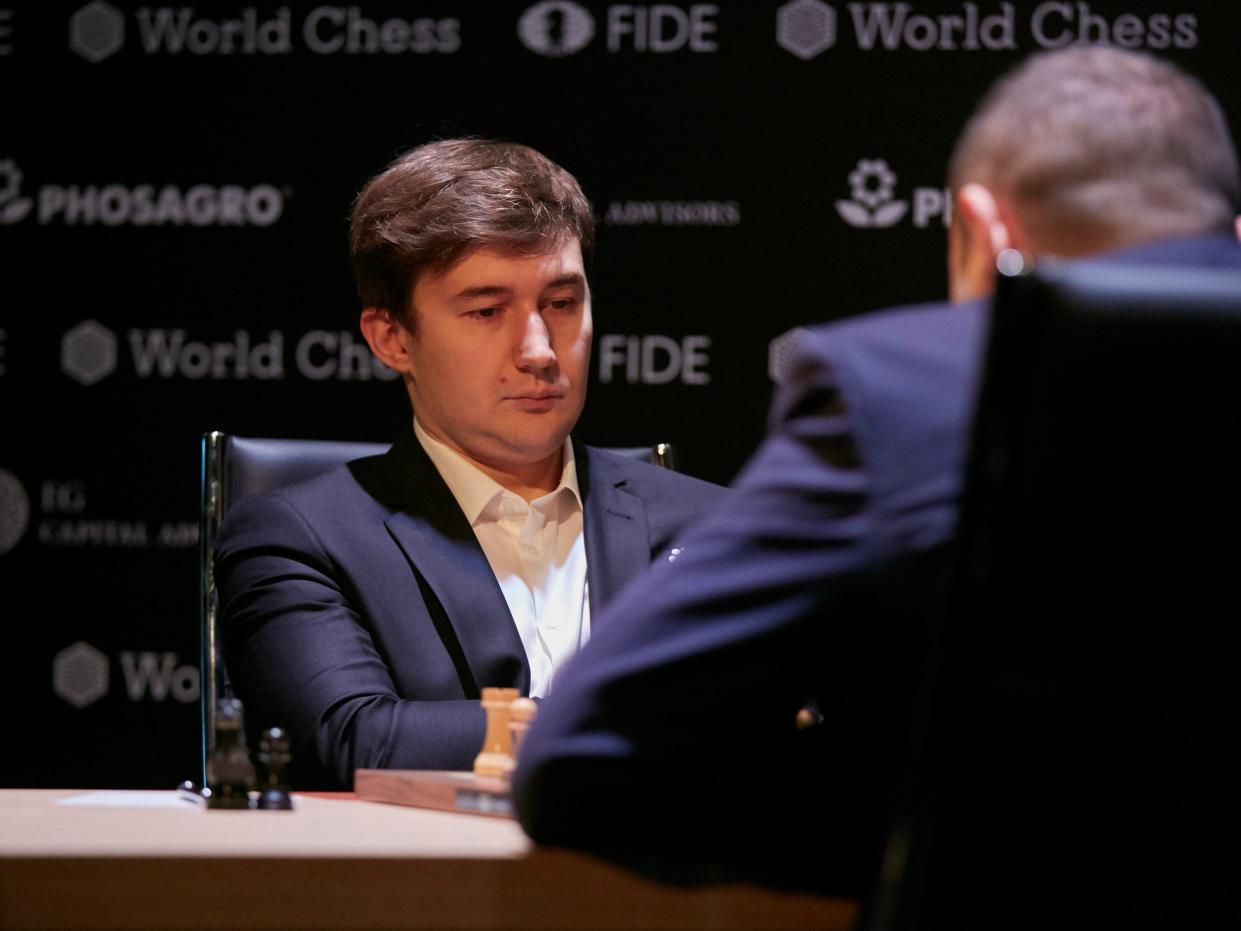 Sergei Karjakin is seen playing the first round at the First Move Ceremony during the World Chess Tournament on March 10, 2018 in Berlin, Germany.