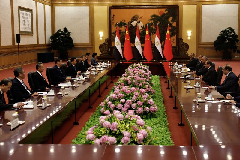 Chinese President Xi Jinping and Egyptian President Abdel Fattah al-Sisi attend a meeting in Beijing