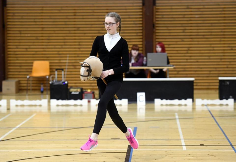 Young Girls In Finland Are Pretending to Ride Horses