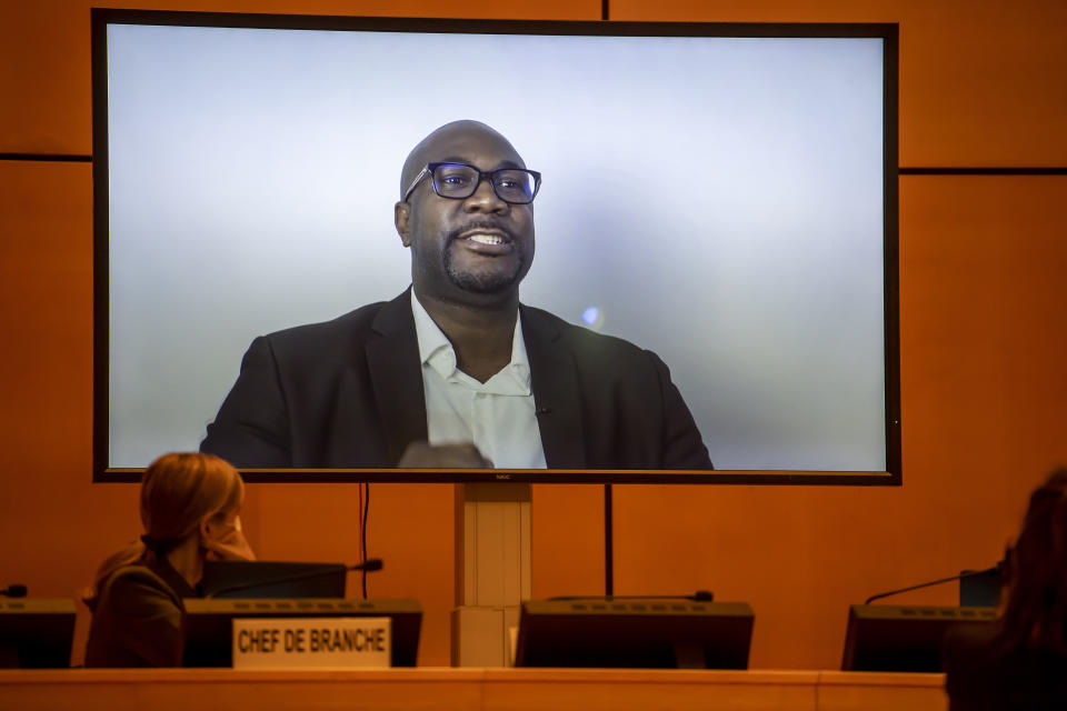 CORRECTS SLUG TO SWITZERLAND GEORGE FLOYD --- Philonise Floyd, left, brother of George Floyd speaks (via video message) at the Human Rights Council of the United Nations in Geneva, Switzerland, Wednesday, June 17, 2020 during an urgent debate on current racially inspired human rights violations, systematic racism, police brutality against people of African descent and violence against peaceful protests. (Martial Trezzini/Keystone via AP, Pool)