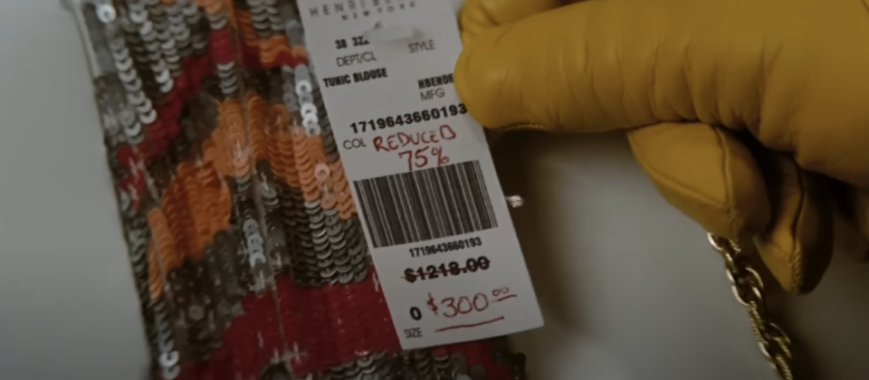 A reduced tag on an item of clothing