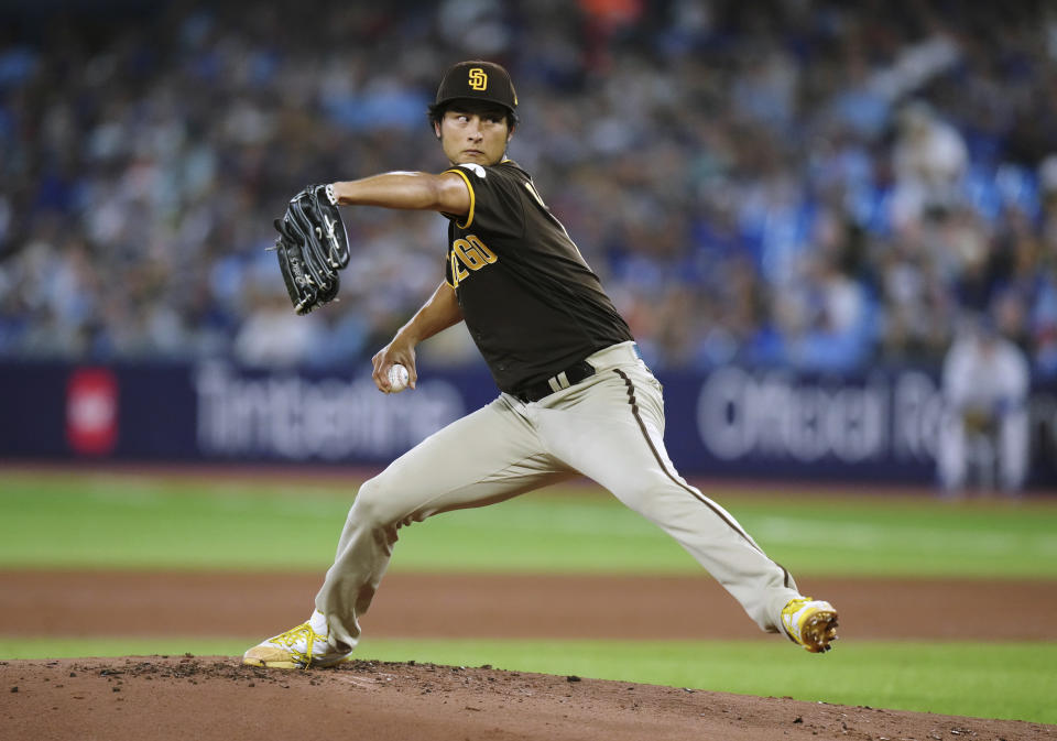 San Diego Padres starting pitcher Yu Darvish works against the Toronto Blue Jays during the first inning of a baseball game Wednesday, July 19, 2023, in Toronto. (Chris Young/The Canadian Press via AP)