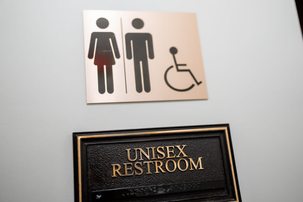 The sign for a unisex bathroom at the Utah Capitol in Salt Lake City is pictured.