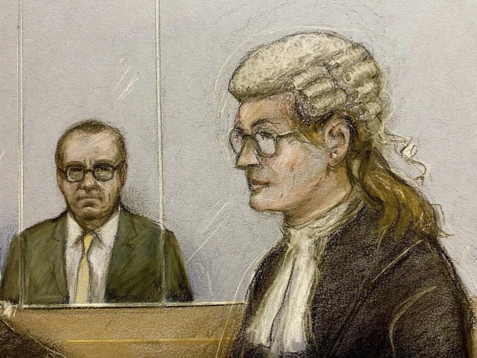 Court artist sketch by Elizabeth Cook of actor Kevin Spacey, left, in the dock as he listens to Christine Agnew KC, right, at Southwark Crown Court, London, Friday, June 30, 2023. Spacey is going on trial on charges he sexually assaulted four men as long as two decades ago. The double-Oscar winner faces a dozen charges at Southwark Crown Court. Spacey pleads not guilty to all charges. (Elizabeth Cook/PA via AP)