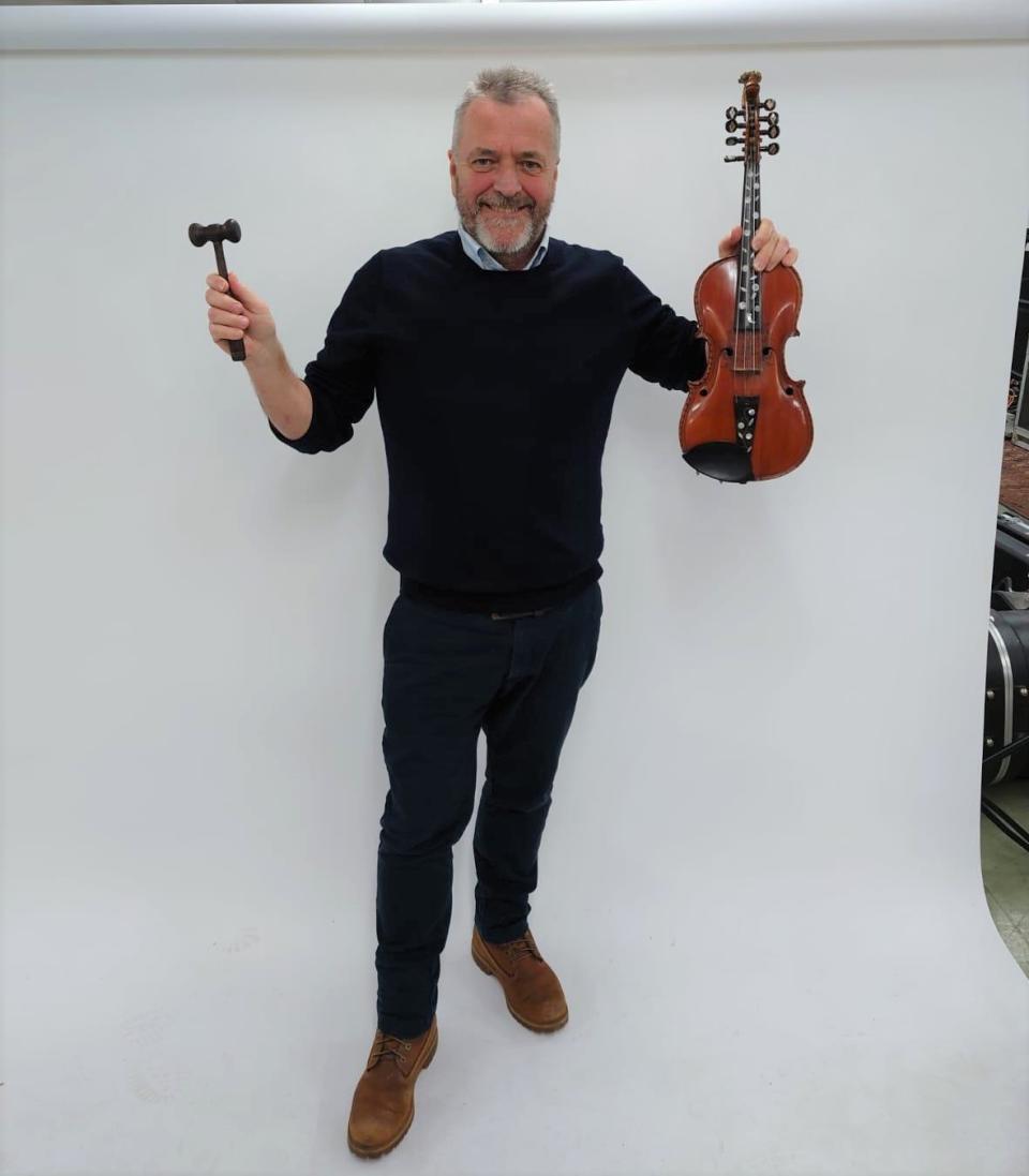 The Hardanger violin is expected to fetch between £3,000 and £6,000 when it is sold in December (Gardiner Houlgate/PA)