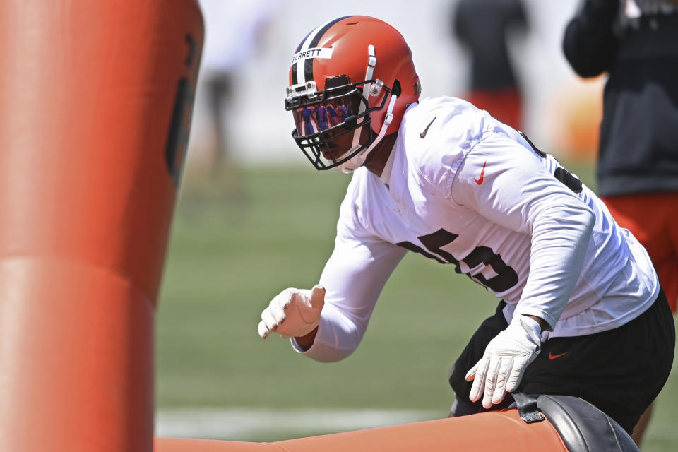 Cleveland Browns defensive lineman Myles Garrett (95) participates in a drill during an NFL football practice at the team training facility, Tuesday, June 15, 2021 in Berea, Ohio. (AP Photo/David Dermer)