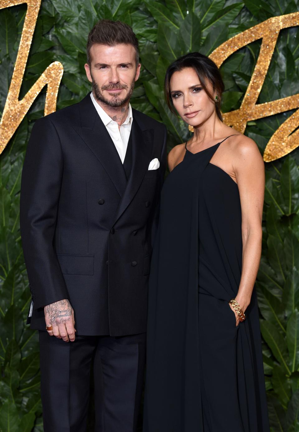 <p>In 1997, cupid's arrow hit Victoria Beckham (then Posh Spice) the second she met Manchester United soccer star David Beckham. "Yes, love-at-first-sight does exist," Victoria told <em><a rel="nofollow noopener" href="https://www.vogue.co.uk/article/victoria-beckham-october-vogue-cover-star" target="_blank" data-ylk="slk:British Vogue;elm:context_link;itc:0;sec:content-canvas" class="link ">British Vogue</a> </em>nearly 20 years later in 2016. "It will happen to you in the Manchester United players' lounge-although you will get a little drunk, so exact details are hazy."</p><p>After nineteen years of marriage and four kids, the Beckhams have been through it all: divorce rumors, cheating allegations..<em>.</em>And while they seem rock solid now, it's hard to tell how much of their picture-perfect relationship comes naturally-and how much they play up for the cameras.</p><p> Ahead, <a rel="nofollow noopener" href="http://drjanegreer.com/" target="_blank" data-ylk="slk:Jane Greer;elm:context_link;itc:0;sec:content-canvas" class="link ">Jane Greer</a>, PhD, relationship expert and author of <em><a rel="nofollow noopener" href="https://www.amazon.com/What-About-Me-Selfishness-Relationship/dp/1402242972?tag=womenshealth-auto-20&ascsubtag=%5bartid%7C2140.a.23652662%5bsrc%7C%5bch%7C" target="_blank" data-ylk="slk:What About Me?;elm:context_link;itc:0;sec:content-canvas" class="link ">What About Me?</a></em>, analyzes the couple's body language cues to figure out if Victoria and David Beckham are still feeling the love. </p>