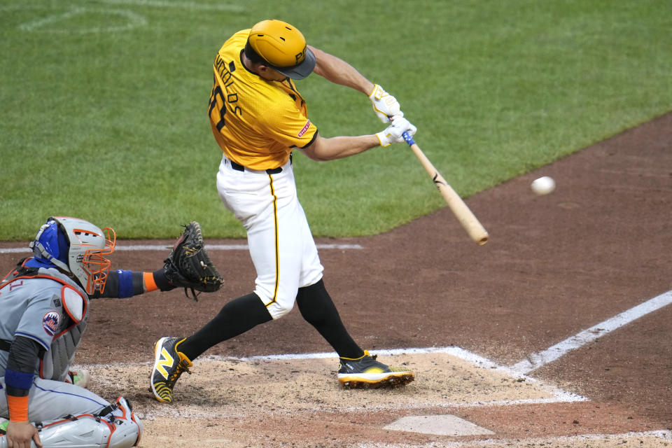 Pittsburgh Pirates' Bryan Reynolds hits a grand slam off New York Mets relief pitcher Jake Diekman during the seventh inning of a baseball game in Pittsburgh, Friday, July 5, 2024. (AP Photo/Gene J. Puskar)