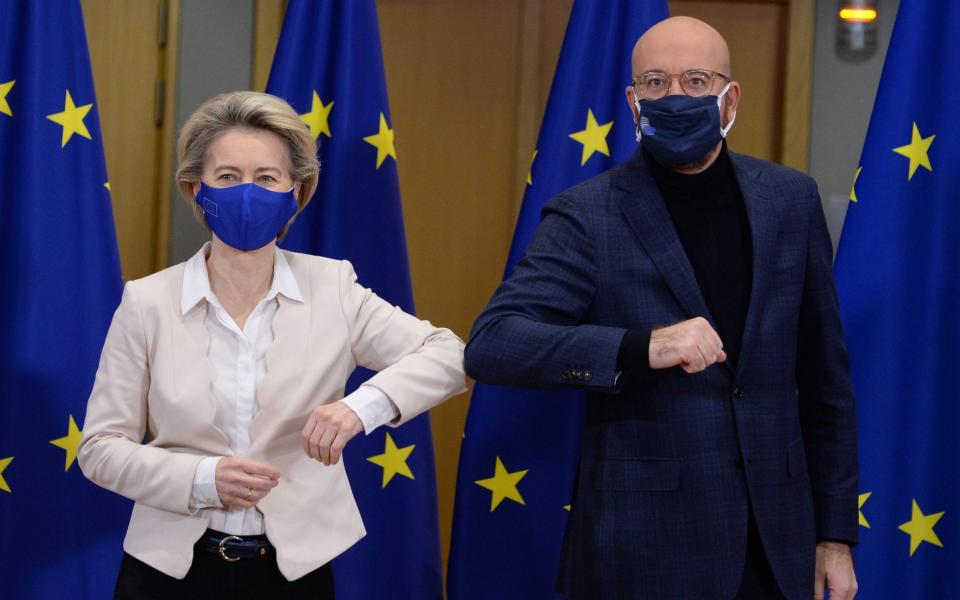 European Commission President Ursula von der Leyen (L) and European Council President Charles Michel bump elbows after signing the Brexit trade agreement  -  JOHANNA GERON/Shutterstock 