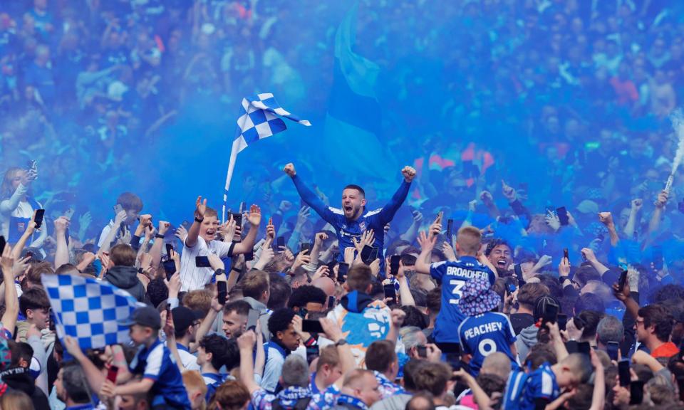 <span>Conor Chaplin and the Ipswich Town fans celebrate after the club’s promotion to the Premier League.</span><span>Photograph: Tom Jenkins/The Observer</span>
