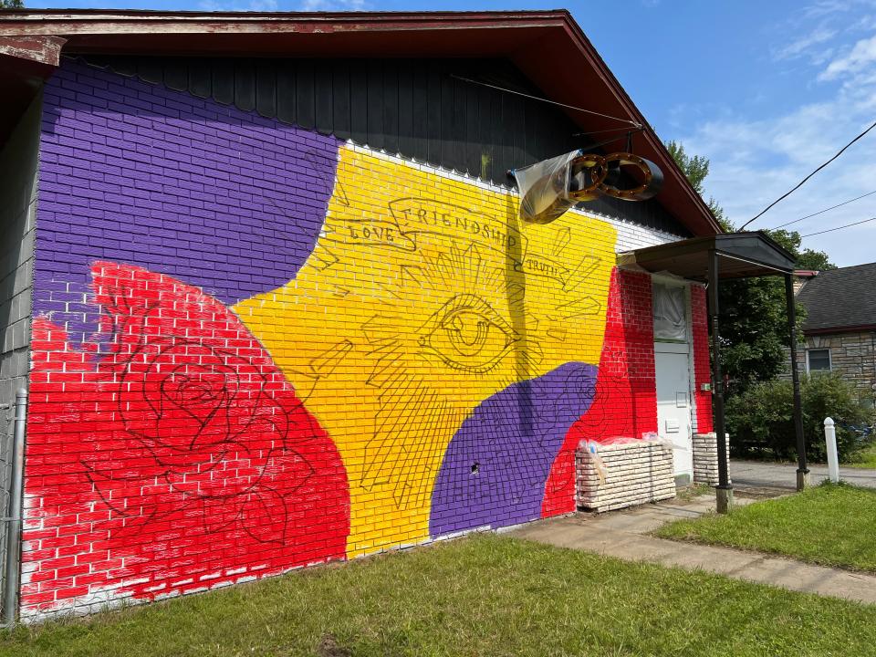 The New North End of Burlington was in the process of getting a new mural on Aug. 3, 2023. The Odd Fellows Lodge on North Ave., the site of the North End Food Pantry, was being prepared for a piece that read "Love, Friendship, Truth" and included hands reaching to grasp one another on the building's side.