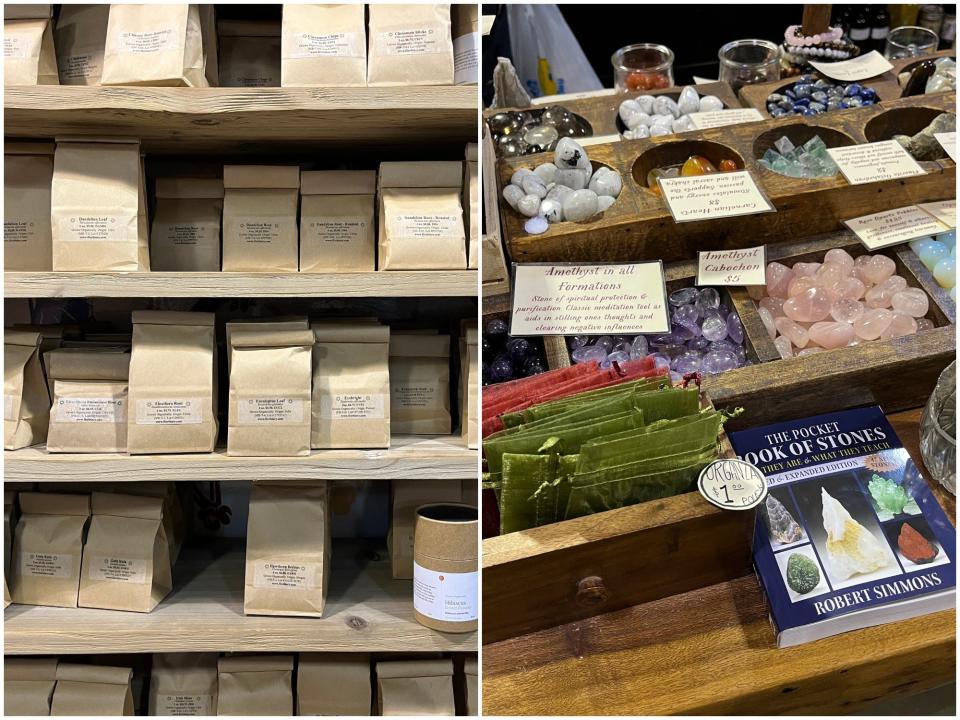 Shelves of organically grown herbs in brown paper bags; an assortment of crystals with information signs on them