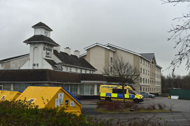 Police outside the Suites Hotel in Knowsley, Merseyside