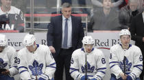 Toronto Maple Leafs coach Sheldon Keefe stands behind the bench during the second period of the team's NHL hockey game against the Washington Capitals, Monday, Feb. 28, 2022, in Washington. (AP Photo/Luis M. Alvarez)