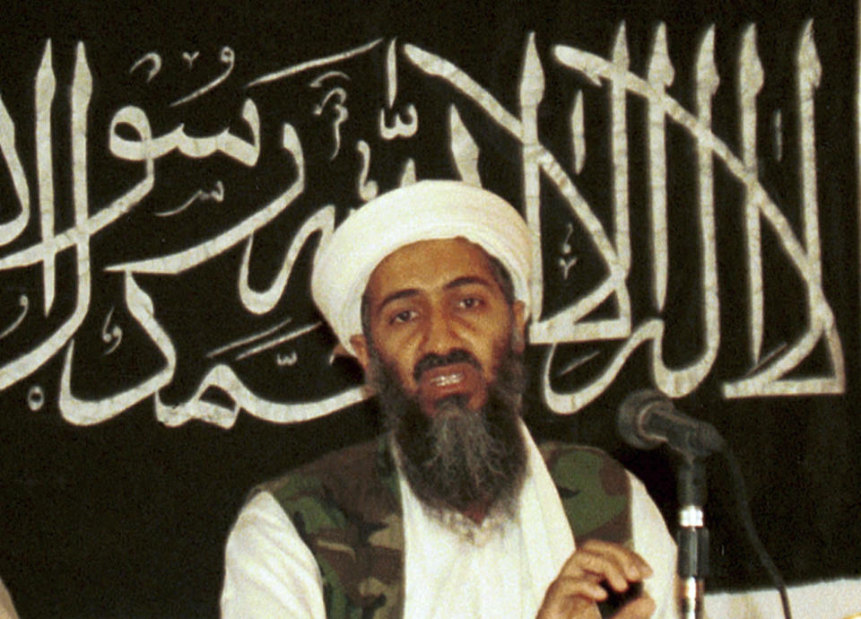 FILE - In this 1998 file photo made available on March 19, 2004, Osama bin Laden is seen at a news conference in Khost, Afghanistan. After 20 years America is ending its “forever” war in Afghanistan. After the terror assault of 9/11 the world rallied behind America and together the US and NATO entered Afghanistan to hunt down and destroy the mastermind Osama bin Laden and his al Qaida terrorist network. But the US and its allies have been dragged into a war between a re-emergent Taliban and an Afghan government, dominated by warlords, whose power and wealth were alienating ordinary Afghans. (AP Photo/Mazhar Ali Khan, File)