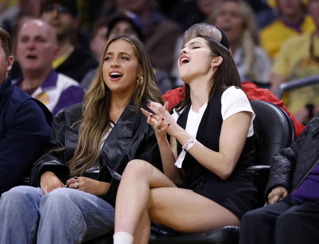 los angeles, california january 19 olivia rodrigo r at and tate mcrae attend the basketball game between the los angeles lakers and brooklyn nets cryptocom arena on january 19, 2024 in los angeles, california note to user user expressly acknowledges and agrees that, by downloading and or using this photograph, user is consenting to the terms and conditions of the getty images license agreement photo by kevork djanseziangetty images