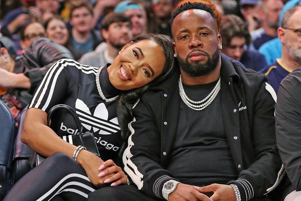 MEMPHIS, TENNESSEE - JANUARY 18: (L-R) Angela Simmons and Yo Gotti attend the game between the Memphis Grizzlies and the Cleveland Cavaliers at FedExForum on January 18, 2023 in Memphis, Tennessee. NOTE TO USER: User expressly acknowledges and agrees that, by downloading and or using this photograph, User is consenting to the terms and conditions of the Getty Images License Agreement. (Photo by Justin Ford/Getty Images)
