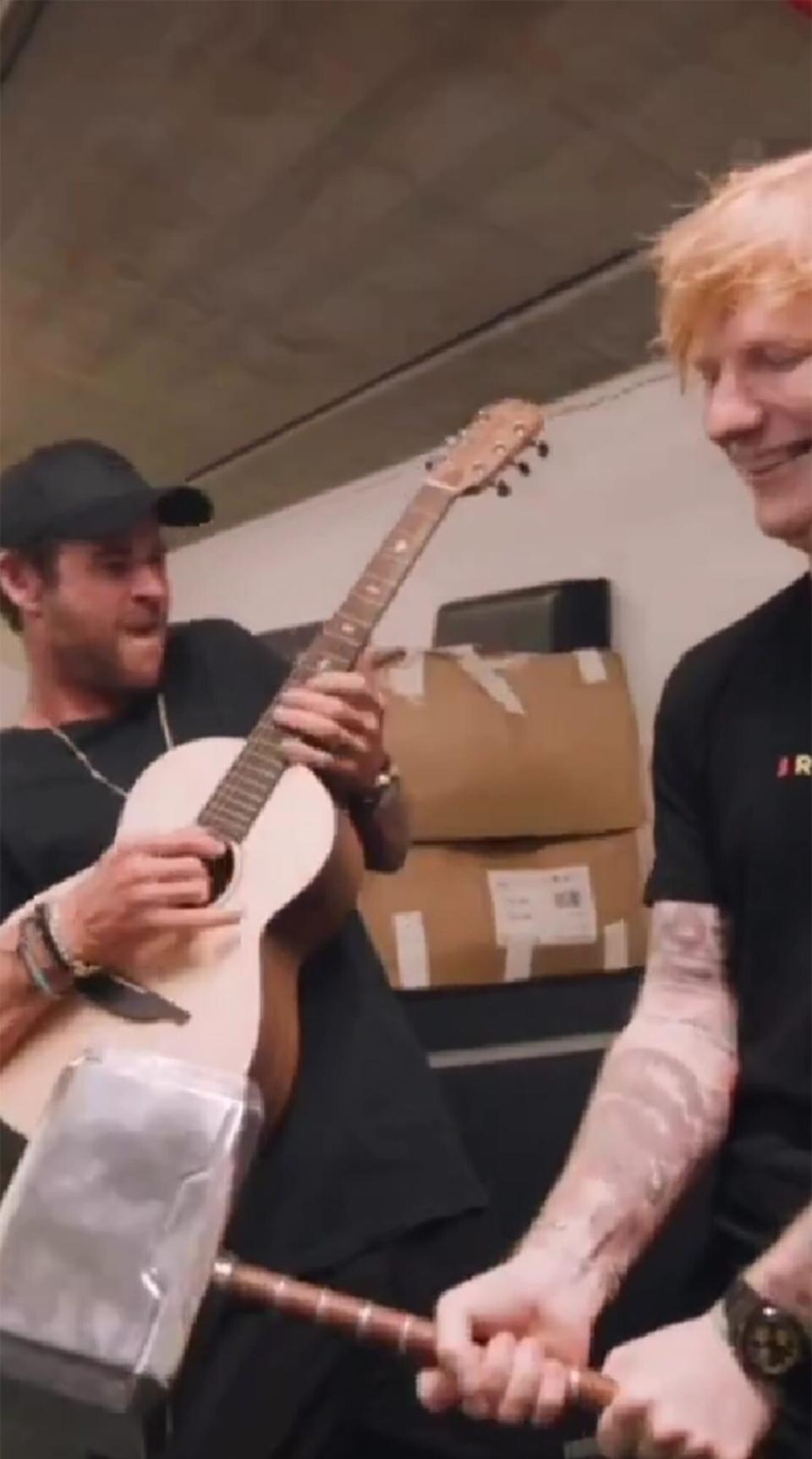 Chris Hemsworth and Ed Sheeran Trade a Guitar for Thor’s Hammer: ‘Swing That Hammer with All Your Soul’