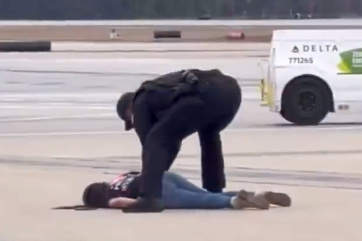The airside arrest was just the start of an incident between a would-be passenger and police  (ATL Uncensored/X)