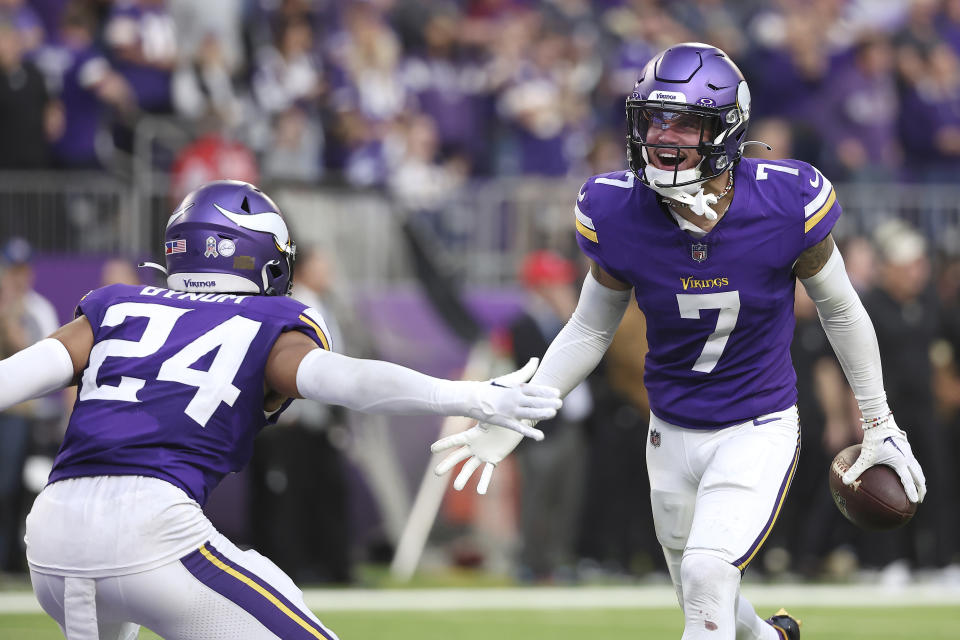 Minnesota Vikings cornerback Byron Murphy Jr. (7) is congratulated by safety Camryn Bynum (24) after intercepting a pass from New Orleans Saints quarterback Jameis Winston during the second half of an NFL football game Sunday, Nov. 12, 2023, in Minneapolis. (AP Photo/Matt Krohn)