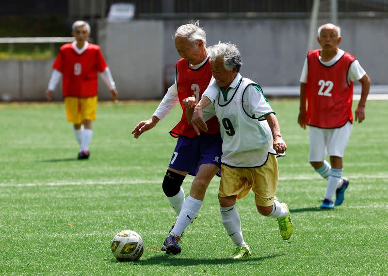 FILE PHOTO: The Wider Image: For Japan's ageing soccer players, 80 is the new 50